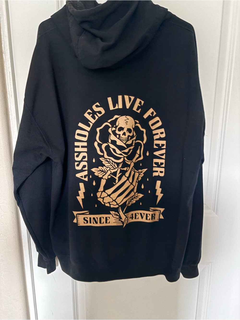 Assholes Live Forever Black Hoodie with Beige Skull & Rose Graphic